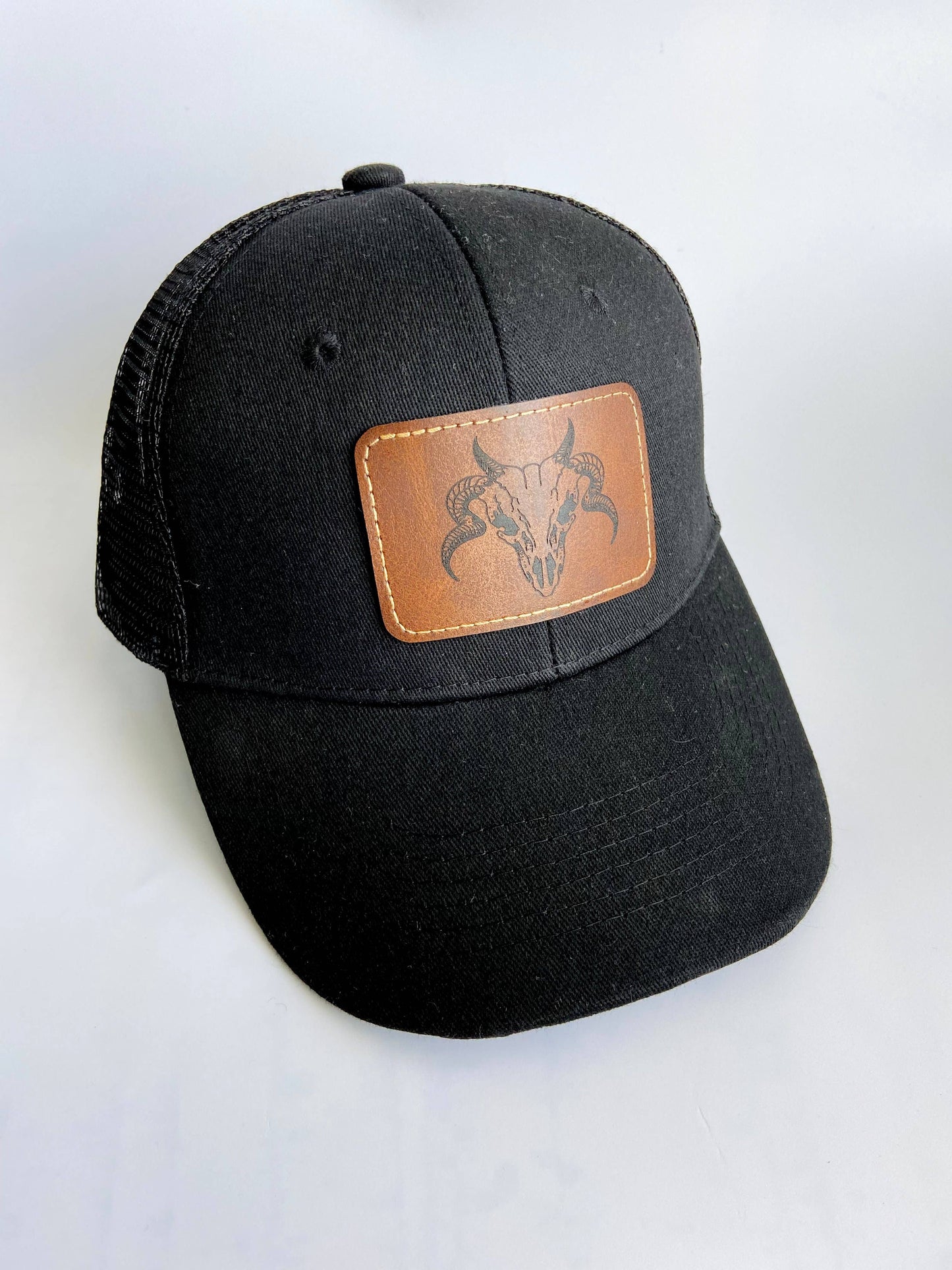 Trucker Hat Black Engraved Leather Skull Snapback